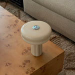 The Affiné Portable Lamp in Crème Beige in hand-blown glass.
