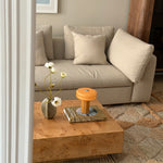 The Affiné Portable Lamp in Soft Amber in hand-blown glass.