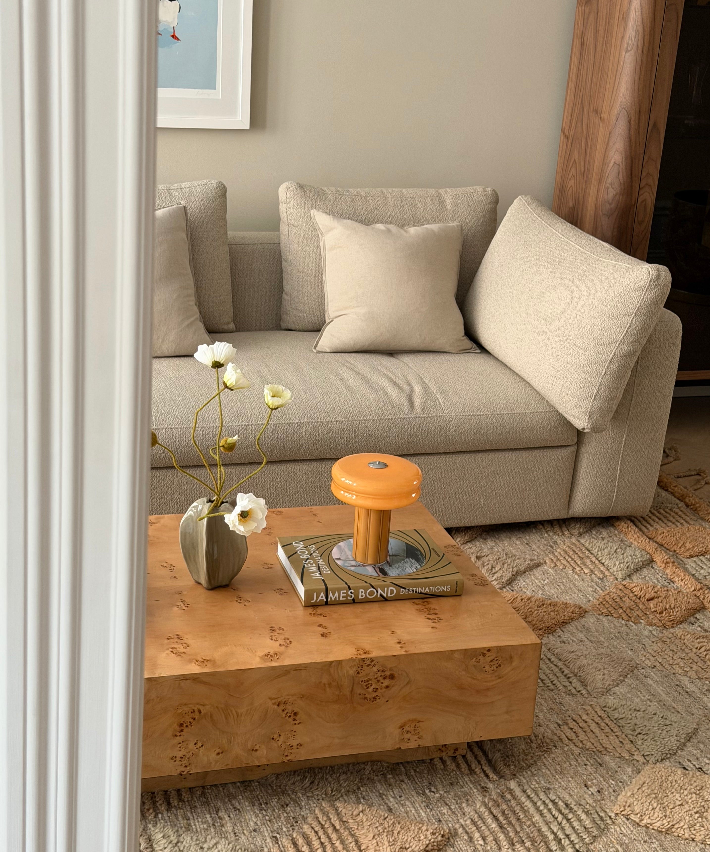 The Affiné Portable Lamp in Soft Amber in hand-blown glass.