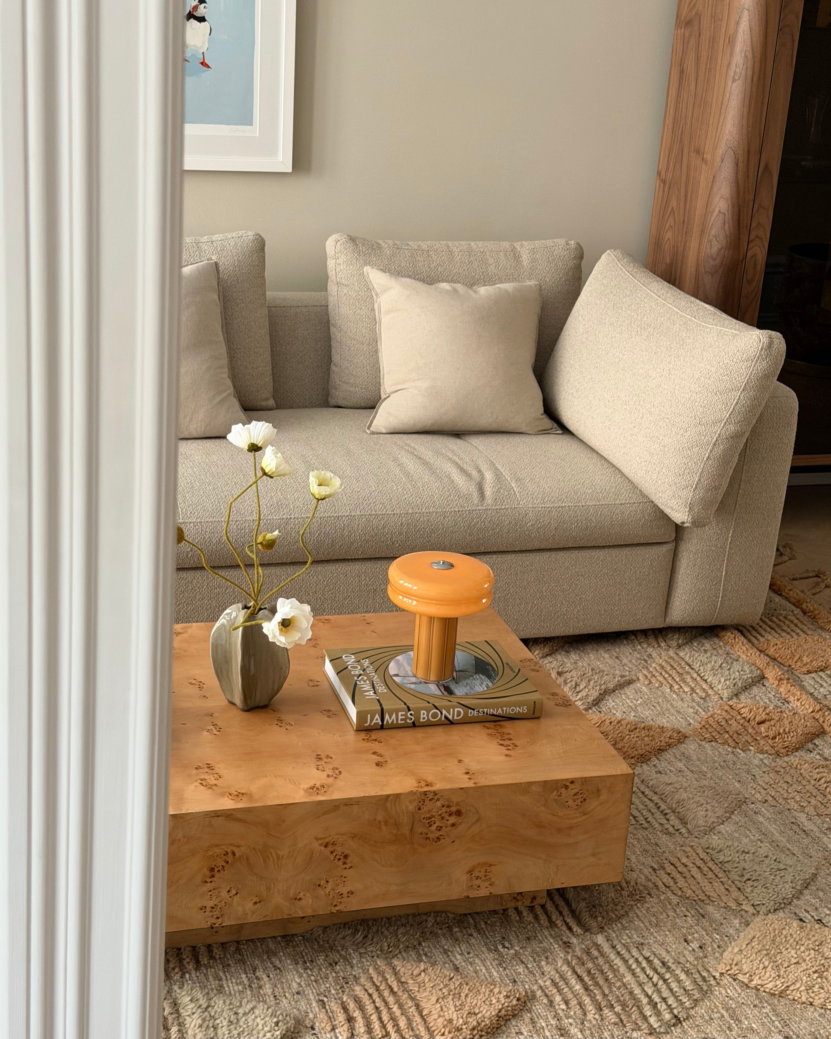 The Affiné Portable Lamp in Soft Amber in hand-blown glass.