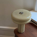 Sage Green Table Lamp standing on a walnut desk