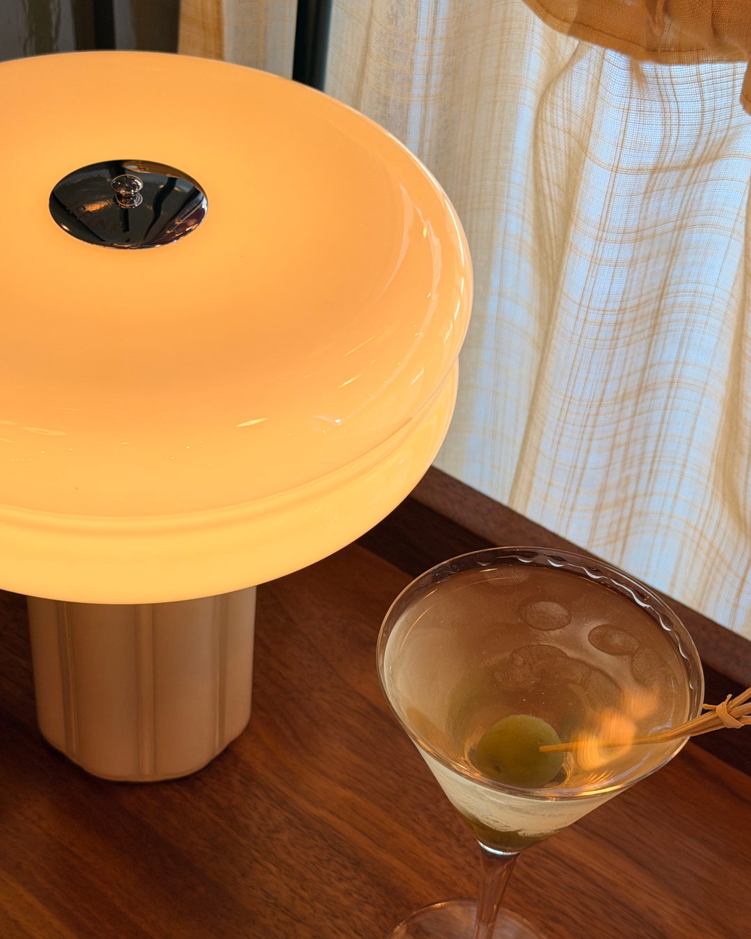 Close-up of the Affiné Portable Lamp in Crème Beige.