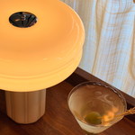 Close-up of the Affiné Portable Lamp in Crème Beige.