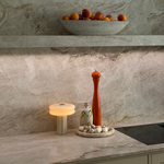 The Affiné Portable Lamp in Crème Beige in a kitchen setting.