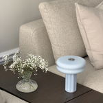 The Affiné Portable Lamp in Powder Blue.