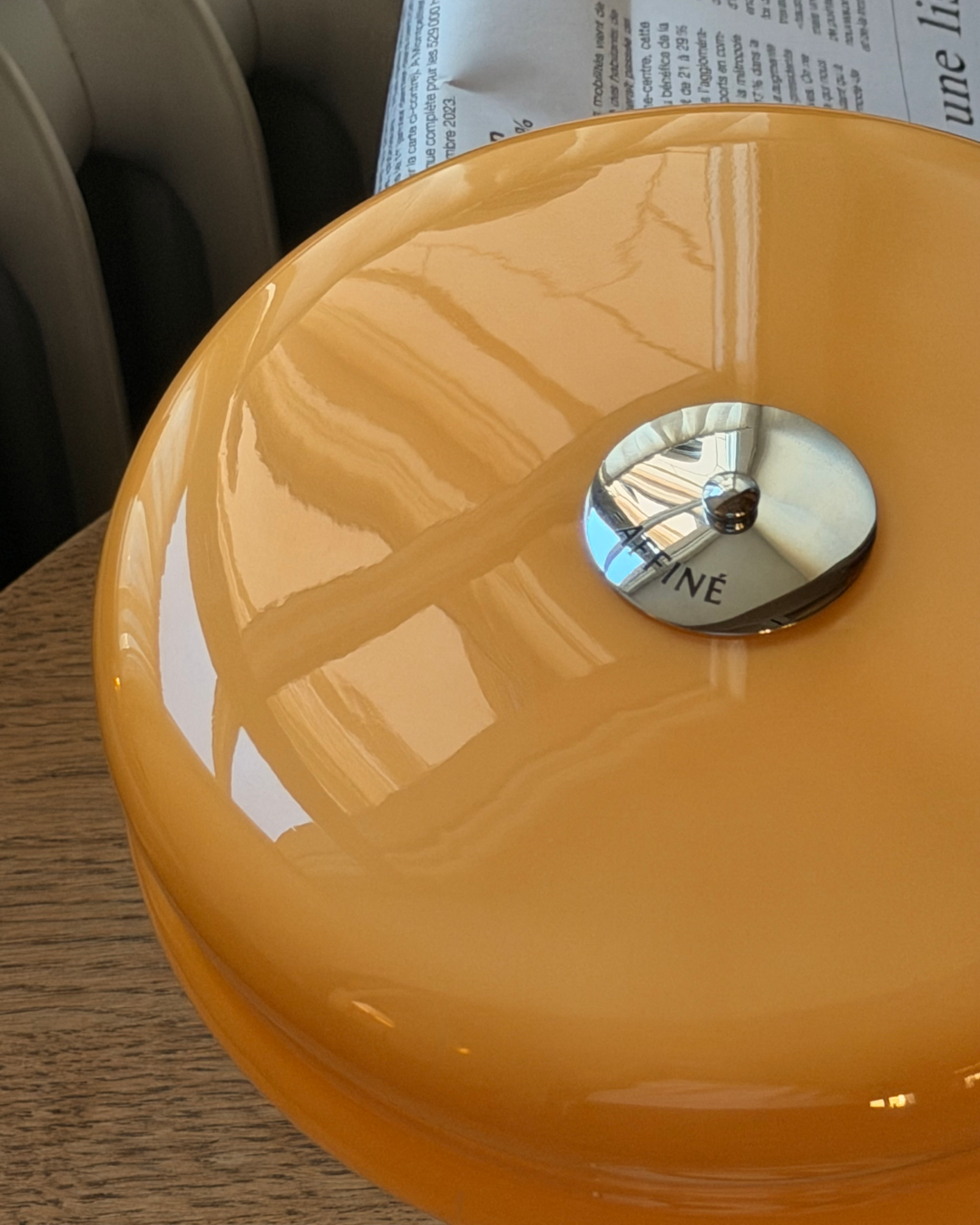 Close-up of the Affiné Portable Lamp in Soft Amber.