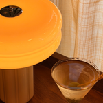 The Affiné Portable Lamp in Soft Amber creating a warm evening glow.