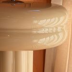 Close-up of the Affiné Table Lamp in Crème Beige.